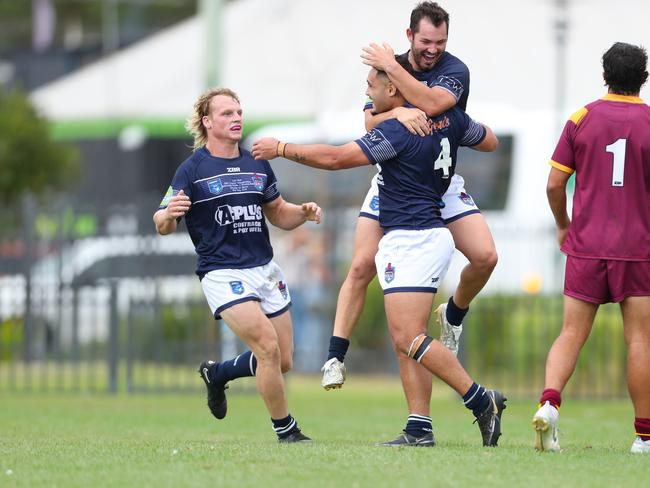 Newcastle celebrate a try. Picture: Sue Graham