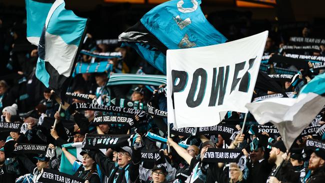 Power fans are planning to make an impact at Adelaide Oval on Saturday – and in Perth a week later in the AFL grand final. Picture: Daniel Kalisz/Getty