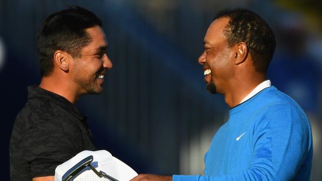 Good friends Jason Day and Tiger Woods.