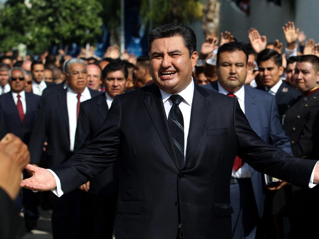 Naason Joaquin Garcia walks among his parishioners in Guadalajara, Mexico. Picture: Ulises Ruiz/AFP