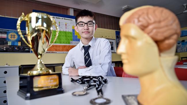 Carlingford High School student Jacob Lee, 15, with his trophy from the competition. Picture: Troy Snook