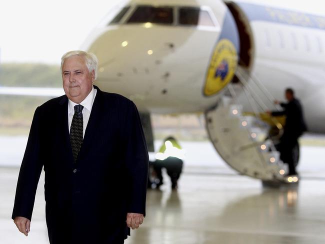 Palmer United Party federal leader Professor Clive Palmer arrives to Brisbane General aviation hanger in one of his newly painted jets.  Picture: Jonathon Searle