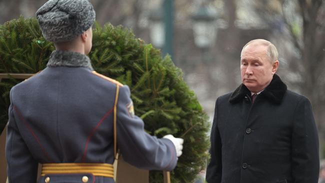 Russian President Vladimir Putin attends a wreath laying ceremony at the Tomb of the Unknown Soldier by the Kremlin wall to mark the Defender of the Fatherland Day in Moscow on February 23, 2022. Picture: Alexey Nikolosy/Sputnik/AFP