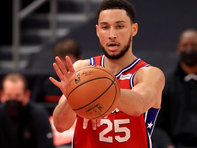 TAMPA, FLORIDA - FEBRUARY 21: Ben Simmons #25 of the Philadelphia 76ers passes during a game against the Toronto Raptors at Amalie Arena on February 21, 2021 in Tampa, Florida. (Photo by Mike Ehrmann/Getty Images) NOTE TO USER: User expressly acknowledges and agrees that, by downloading and or using this photograph, User is consenting to the terms and conditions of the Getty Images License Agreement.