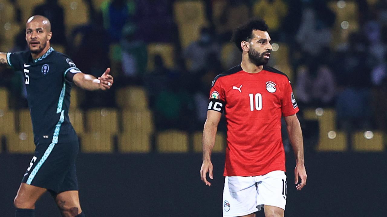 Egypt's forward Mohamed Salah (R) reacts during the Africa Cup of Nations match between Nigeria and Egypt at Stade Roumde Adjia in Garoua,