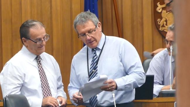 Clarence Valley Council mayor Jim Simmons and director corporate Ashley Lindsay discuss the agenda before a council meeting.