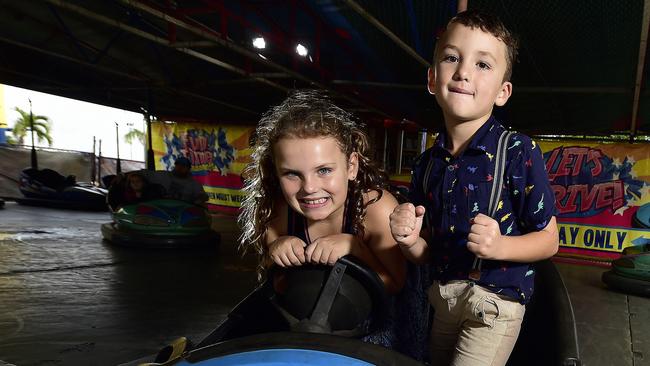 Isabella, 8, and Hamish Heslin, 6 on the new dodge em cars at Townsville Mini Golf, a collaboration with ride operators who have found themselves without business after many shows and carnivals were cancelled. PICTURE: MATT TAYLOR.