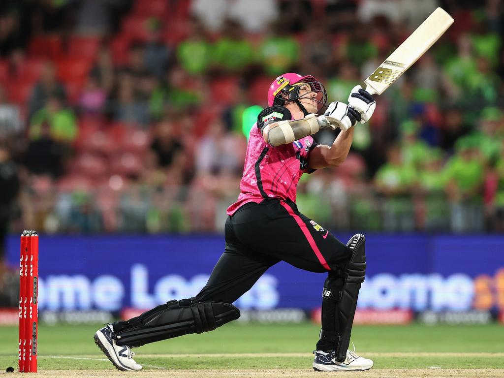 Ben Dwarshuis hits a six on the second last delivery for the Sixers. Picture: Getty Images