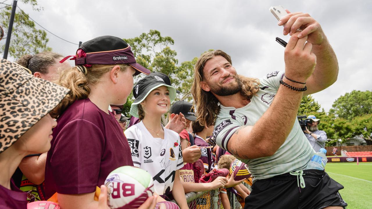 Patrick Carrigan takes a selfie with Mia Shyhun at the Brisbane Broncos Captain's Run and Toowoomba Fan Day at Toowoomba Sports Ground, Saturday, February 15, 2025. Picture: Kevin Farmer