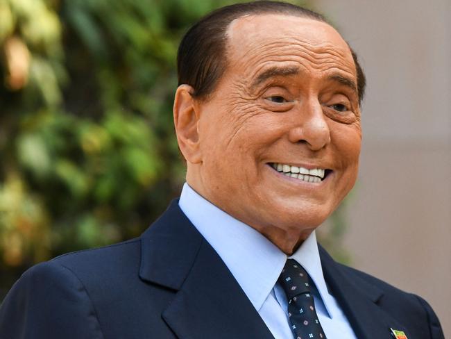 (FILES) In this file photo taken on September 14, 2020 former Italian prime minister Silvio Berlusconi addresses the media, as he leaves the San Raffaele Hospital in Milan after he tested posititive for coronavirus and was hospitalied since September 3. - Billionaire former premier Silvio Berlusconi announced on January 22, 2022 he will not run for Italy's presidency, ending his improbable candidacy two days before voting begins in parliament. (Photo by Piero CRUCIATTI / AFP)