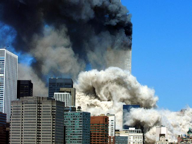 (FILES) In this file photo taken on September 11, 2001, smoke billows after the first of the two towers of the World Trade Center collapses. - The remains of two more victims of 9/11 have been identified, thanks to advanced DNA technology, New York officials announced on September 8, 2021, just days before the 20th anniversary of the attacks. The office of the city's chief medical examiner said it had formally identified the 1,646th and 1,647th victim of the al-Qaeda attacks on New York's Twin Towers which killed 2,753 people. They are the first identifications of victims from the collapse of the World Trade Center since October 2019. (Photo by HENNY RAY ABRAMS / AFP)