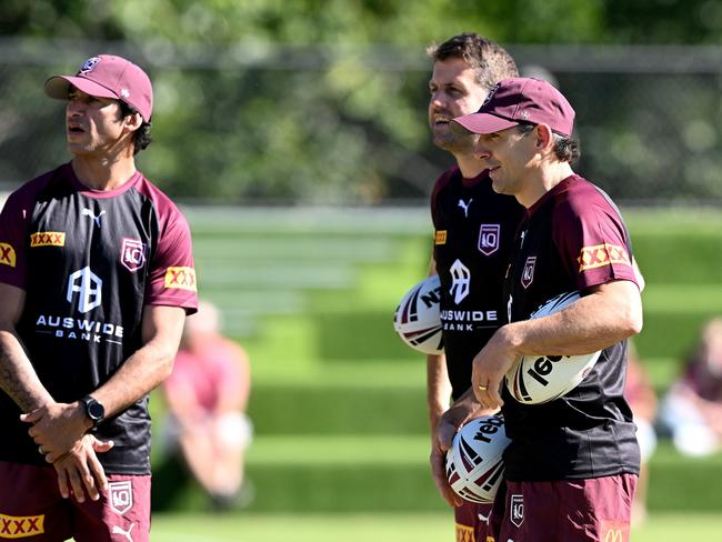 Queensland coach Billy Slater (right) and skipper Daly Cherry-Evans agreed to be personal references for Hannay (middle). Picture: Getty Images