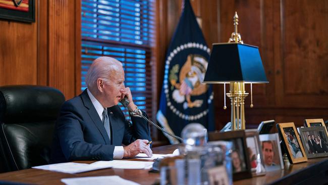 Joe Biden speaks on the phone to Vladimir Putin on diplomatic solutions to soaring Russia-West tensions over Ukraine. Picture: AFP.