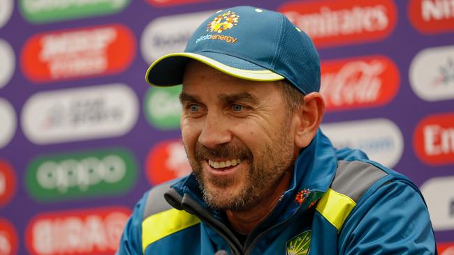 Australian head coach Justin Langer has been giving the iPad a work out. Picture: Getty