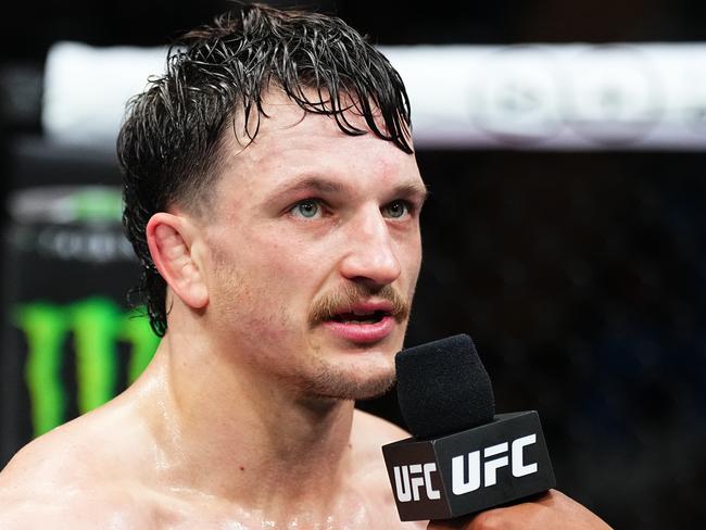 PERTH, AUSTRALIA - AUGUST 18: Jack Jenkins of Australia reacts after a TKO victory against Herbert Burns of Brazil in a featherweight fight during the UFC 305 event at RAC Arena on August 18, 2024 in Perth, Australia. (Photo by Jeff Bottari/Zuffa LLC)