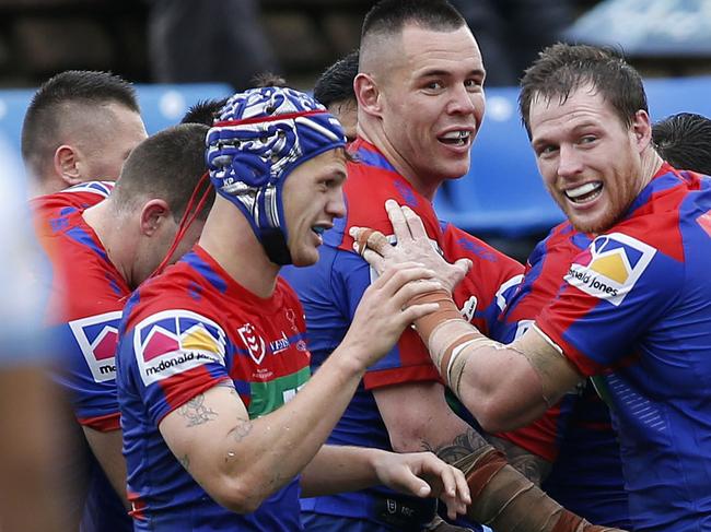 Knights players celebrate a try to Hymel Hunt during the Round 24 NRL match between the Newcastle Knights and the Gold Coast Titans at McDonald Jones Stadium in Newcastle, Saturday, August 31, 2019. (AAP Image/Darren Pateman) NO ARCHIVING, EDITORIAL USE ONLY