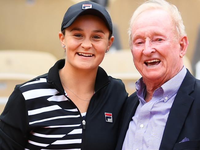 Ashleigh Barty celebrates her victory with Australian tennis legend Rod Laver. Picture: Getty