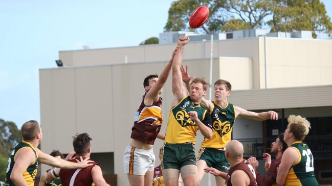 Action from the Marion v Houghton division six Adelaide Footy League clash. credit Andrew Supple