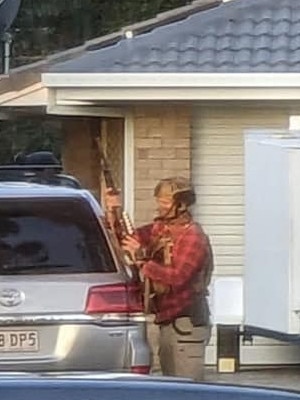 Heavily armed police have raided a Birkdale home.