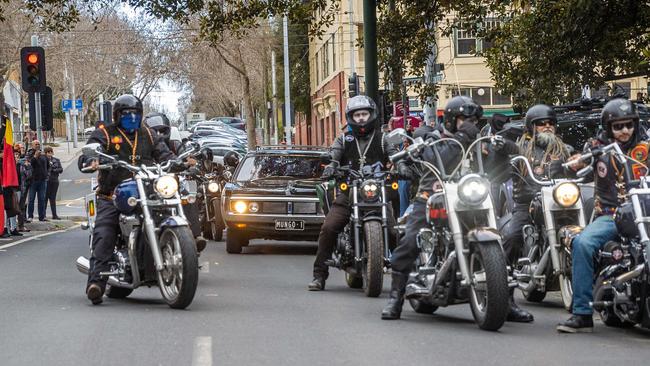 The Archie Roach funeral motorcade makes it was through Melbourne. Picture: Jake Nowakowski