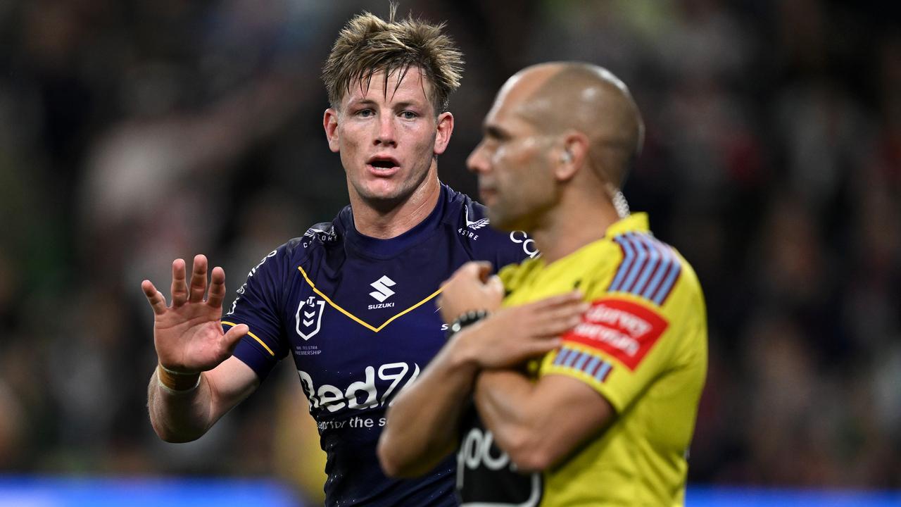 (L-R) Harry Grant of the Storm talks to Ashley Klein. Picture: NRL Images