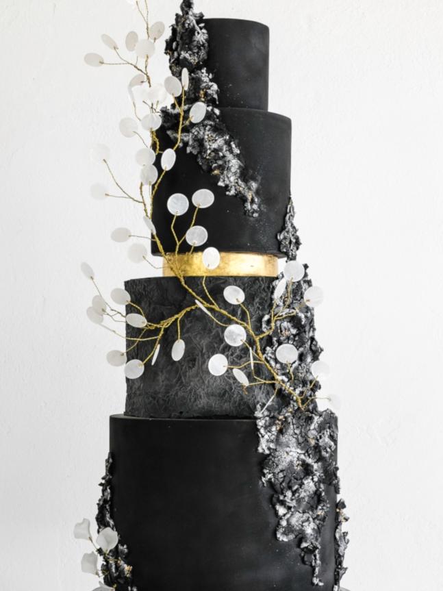 Black wedding cake by Lyons Den Cakes.