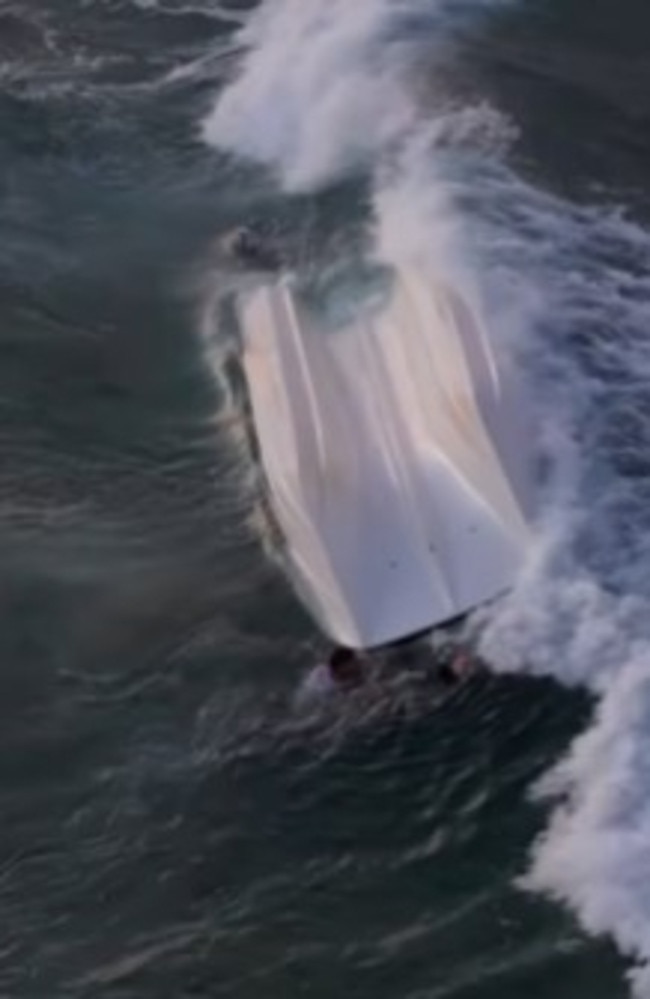 The overturned vessel off Amity Point, North Stradbroke Island. Photo: @nicka35 Instagram