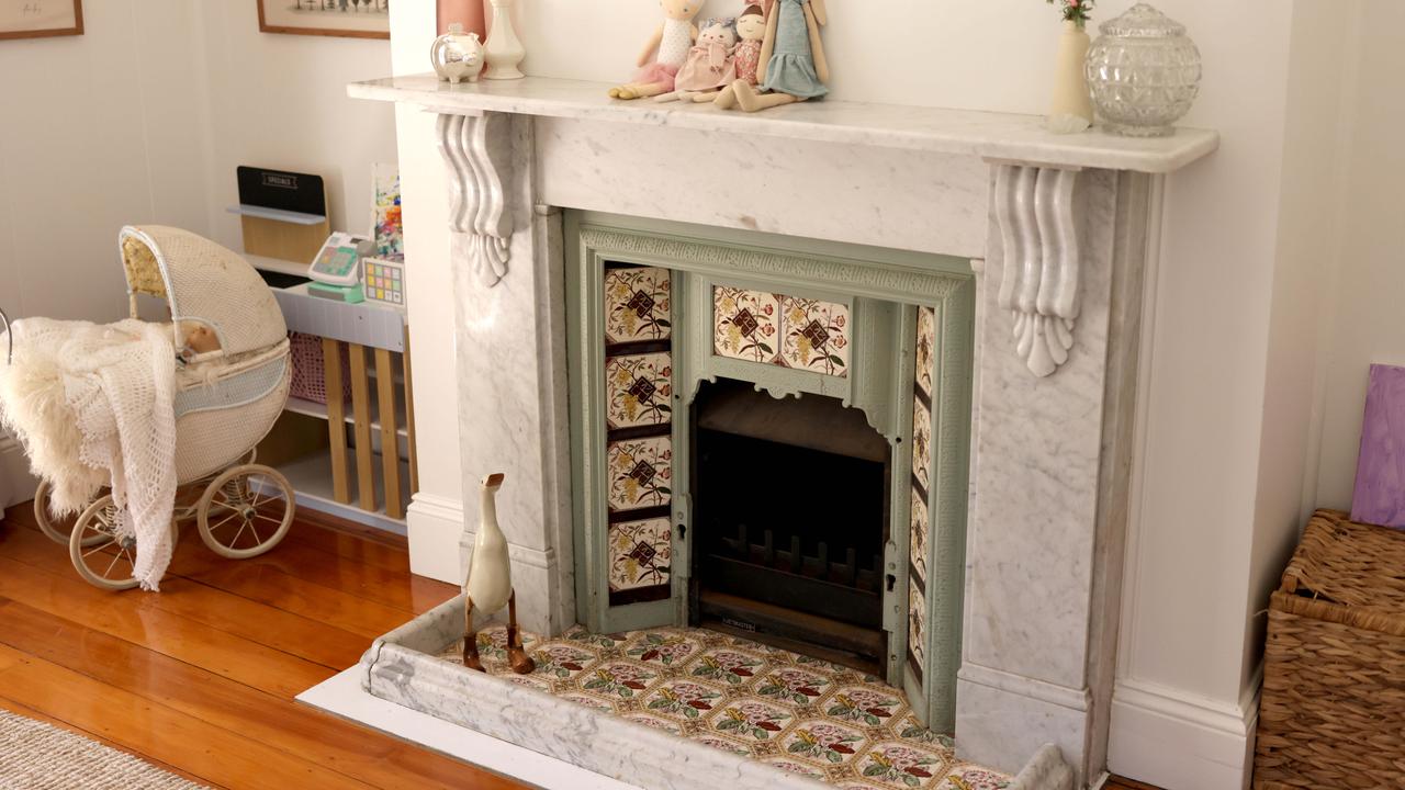Original fireplaces can be found throughout the heritage home. Photo: Steve Pohlner.