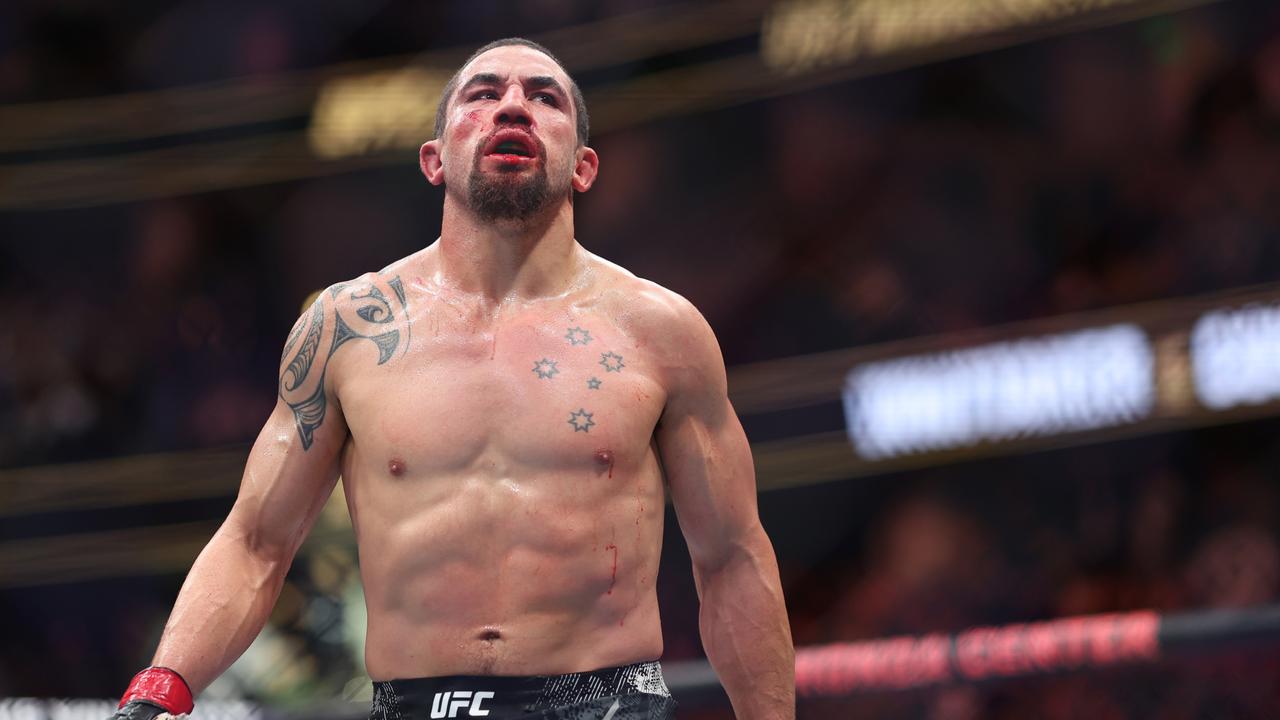 ANAHEIM, CALIFORNIA – FEBRUARY 17: Robert Whittaker of New Zealand celebrates defeating Paulo Costa of BrazilÃ&#130;Â in their middleweight fight during UFC 298 at Honda Center on February 17, 2024 in Anaheim, California. (Photo by Sean M. Haffey/Getty Images)