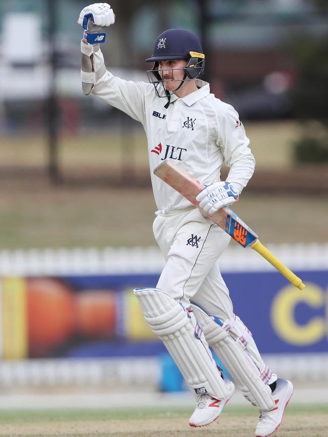 Nic Maddinson celebrates his century. 