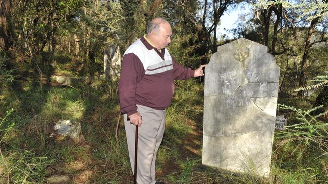 Historian Tom Richmond visiting the cemetery in 2011.