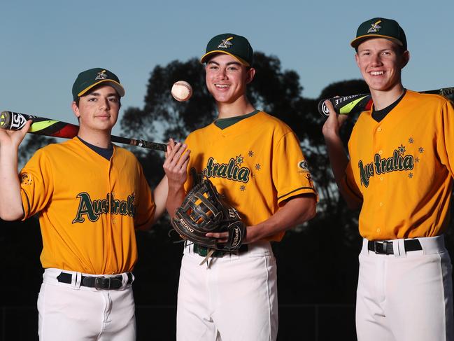 Alex Ranieri, 15, Solomon Maguire, 15, and Nicholas Chappell, 15, pose for a photo at Fred Patterson Baseball Field in Castle Hill today, July 23, 2018. The three Castle Hill baseballers have been selected to represent Australia at the U15 World Cup in Panama. (AAP Image/David Swift)