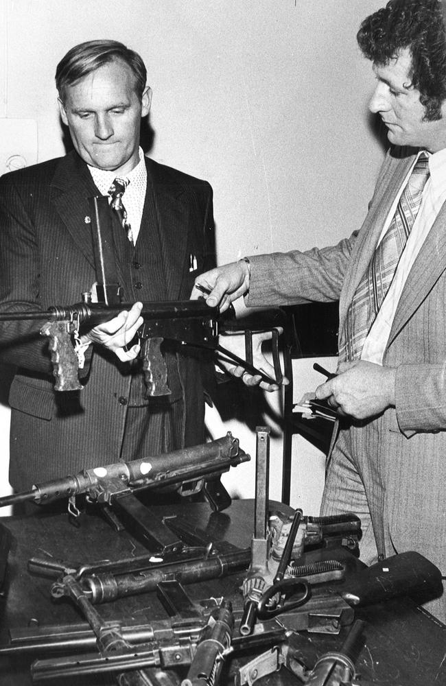 April 1976: Detectives display machine guns they believe were used in the Great Bookie Robbery at the Victoria Club in Queen Street. Picture: Herald Sun