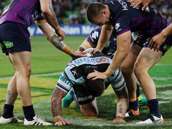 Storm players give Andrew Fifita a friendly reminder he made a mistake. Picture: Colleen Petch