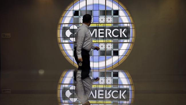 the Merck logo on a stained glass panel at a Merck company building in the US. (AP Photo/Mel Evans)