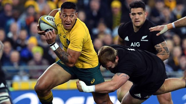 Israel Folau is tackled by Codie Taylor during the Rugby Championship Test.