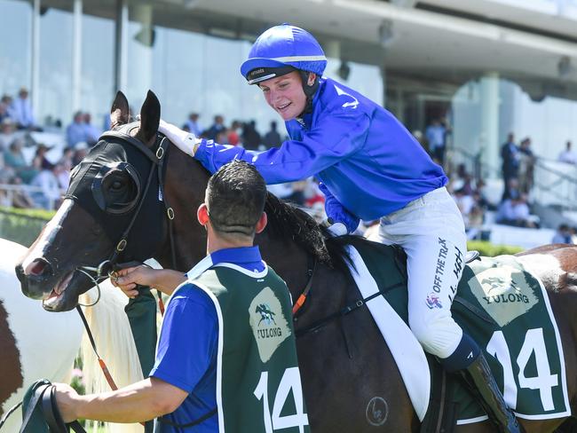 Jamie Kah returns to the mounting yard on Cylinder after winning the Yulong Newmarket Handicap at Flemington Racecourse on March 09, 2024 in Flemington, Australia. (Photo by Brett Holburt/Racing Photos via Getty Images)