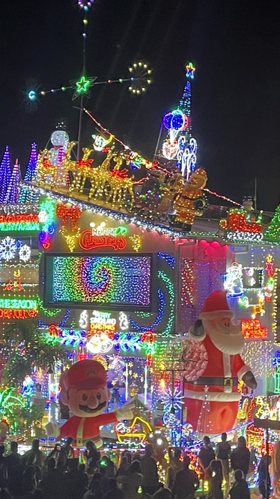 Strickland Christmas light display draws monster crowds