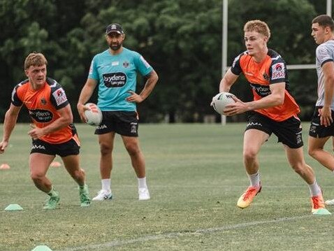 Benji Marshall watches young guns Lachlan Galvin (right) and Will Craig at pre-season training. Picture: Wests Tigers