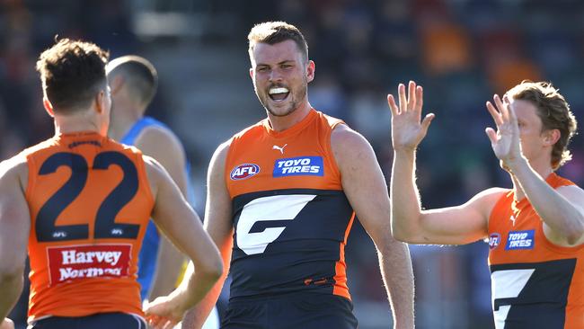 Giants Kieren Briggs celebrates with Josh Kelly after Kelly goal during the AFL Round 19 match between the GWS Giants and Gold Coast Suns at Manuka oval, Canberra on July 22, 2023. Photo by Phil Hillyard(Image Supplied for Editorial Use only - **NO ON SALES** - Â©Phil Hillyard )