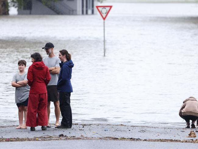 Residents take in Lismore under floodwaters. Picture: Matrix/ Nathan Smith.