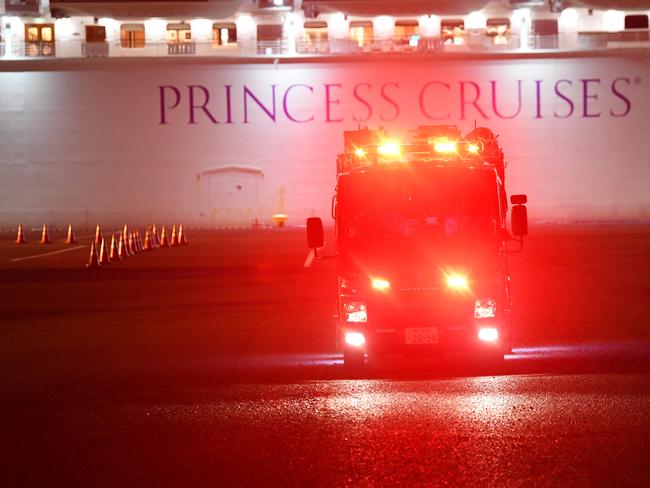 An emergency services vehicle drives away from the Diamond Princess cruise ship. Picture: Getty