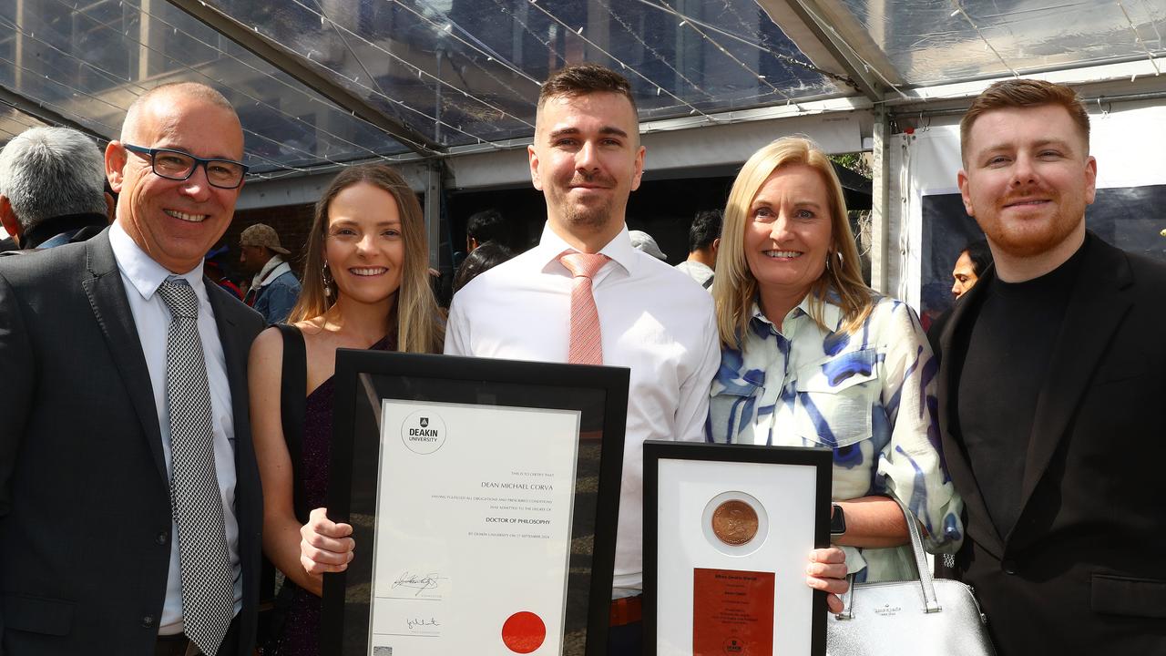 Deakin University graduate Dr Dean Corva with parents Stephen, fiancÅ½ Rebecca, mum Amanda and brother Glenn. Picture: Alison Wynd