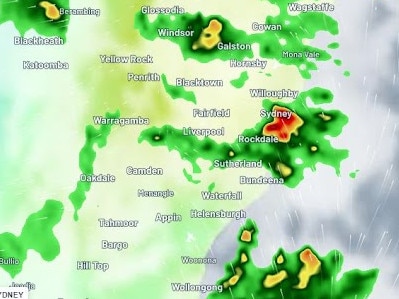 A fast burst of heavy rain and hail fell over Sydney, drenching the city and its surrounds in the space of just minutes, as the state deals with a "trail of carnage" left by heavy rains and flash floods. Picture: Weatherzone