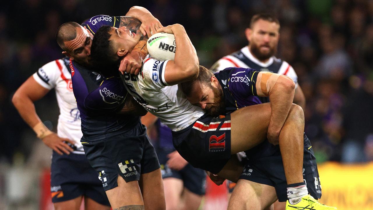 Nelson Asofa-Solomona grabs Joseph Suaalii high . NRL Imagery