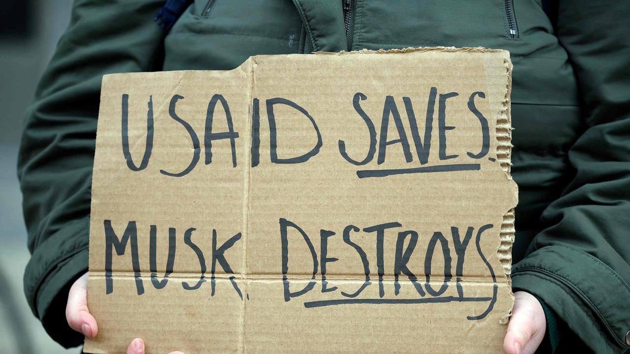 An employee of USAID who wished to remain anonymous protests outside of the USAID headquarters on February 03, 2025 in Washington, DC. (Photo by Kevin Dietsch / GETTY IMAGES NORTH AMERICA / Getty Images via AFP)