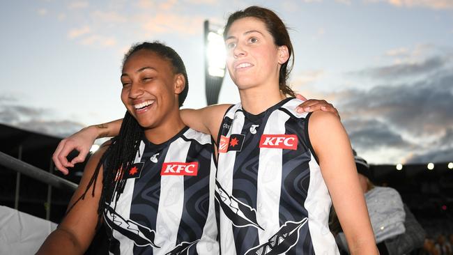 Sabrina Frederick and Olivia Barber enjoy a win over Geelong.