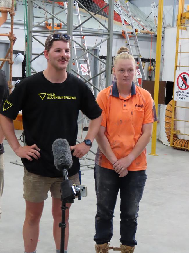 Carpenter Daniel Richardson and apprentice plumber Halle Whitehead speak to the media at Cambridge on Wednesday, December 18, 2024.