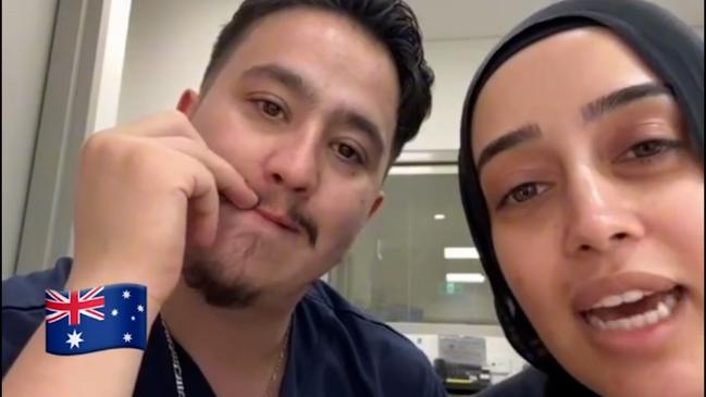 Ahmad ‘Rashad’ Nadir and Sarah Abu Lebdeh, wearing their NSW Health uniforms, in the video. Picture: NewsWire Handout