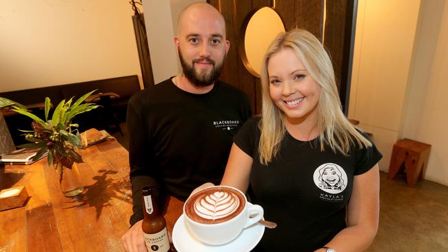 Pictured at Blackboard Coffee at Varsity Lakes, restaurant Owner Marc Kinvig with Kayla Hanna. Picture Mike Batterham